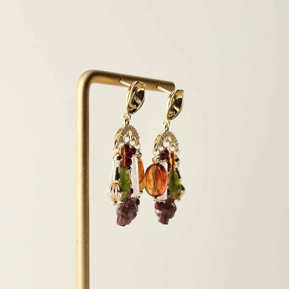 Multi charm brown and green arc stud earrings