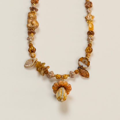 Kralenketting met paddenstoel hoofdkraal