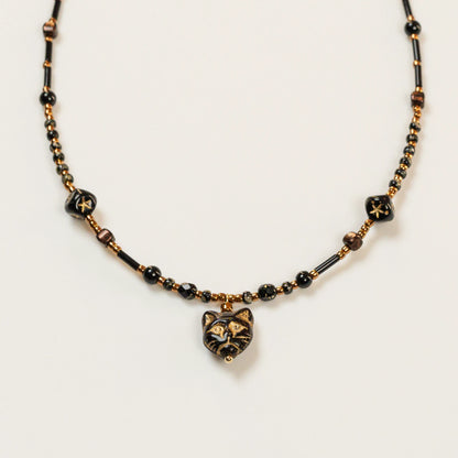 Kralenketting met zwarte agaat en katkraal