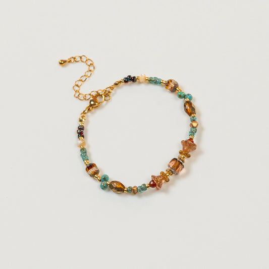 Kralenarmband van glas in de vorm van snoep