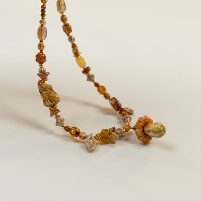 Kralenketting met paddenstoel hoofdkraal