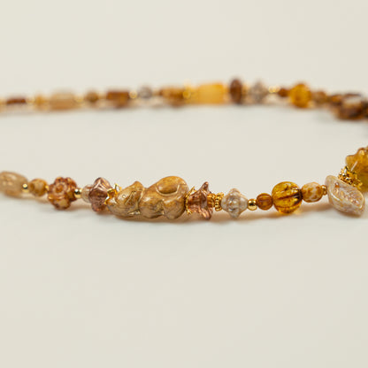 Kralenketting met paddenstoel hoofdkraal