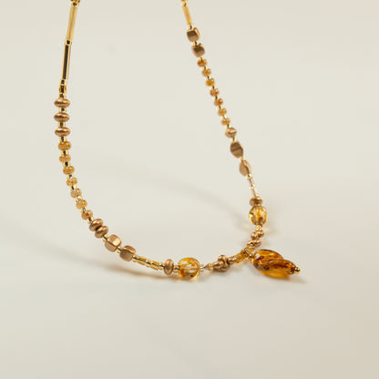 Kralenketting met gouden twisted leaf