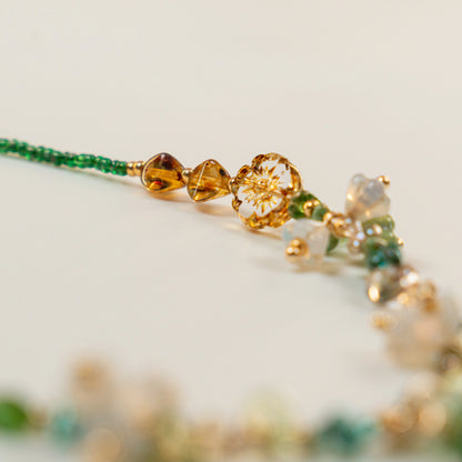 Kralenketting met bosgroene druppelkralen