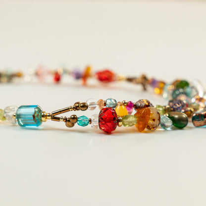 Dubbele kralenketting met blauwe vlindervormige