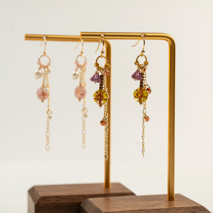 Kraaltjes oorbellen met lange ketting, bloem en parels