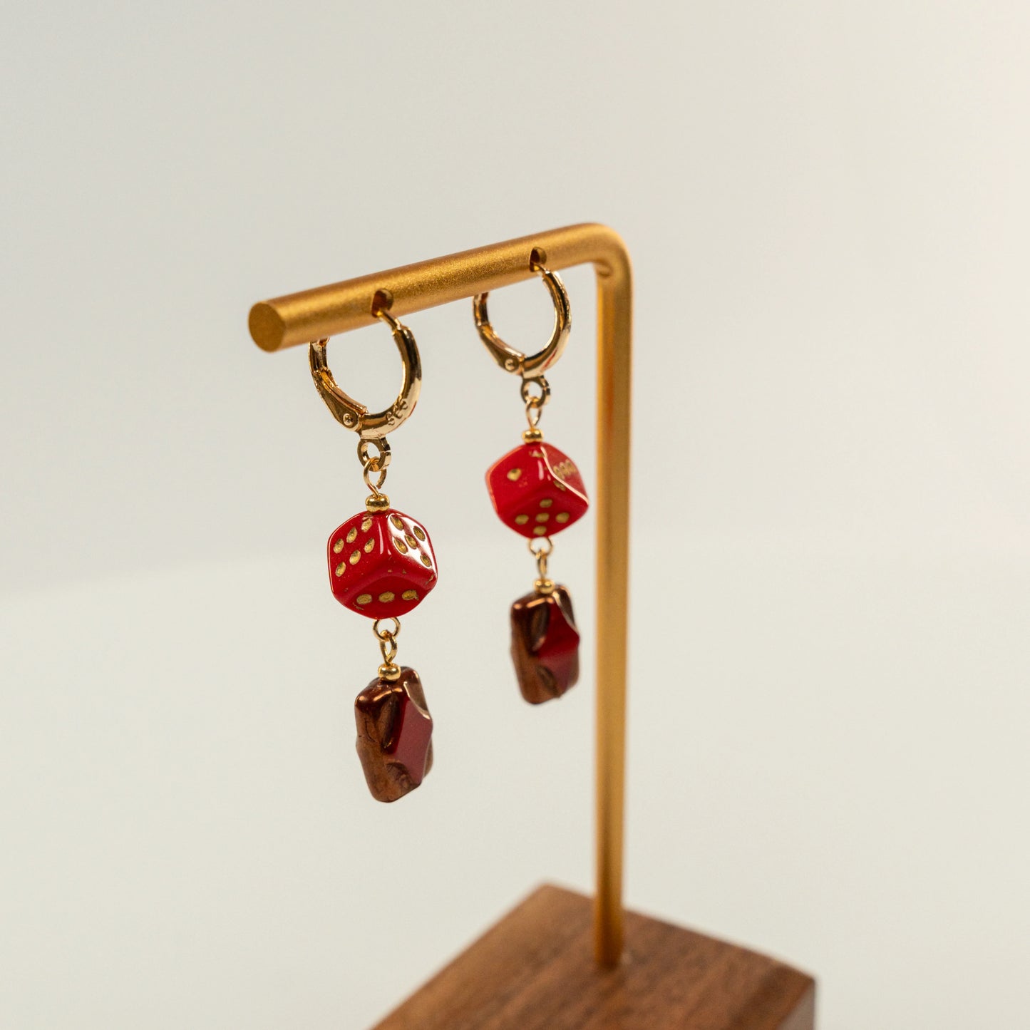 Kraaltjes oorbellen met dobbelsteen