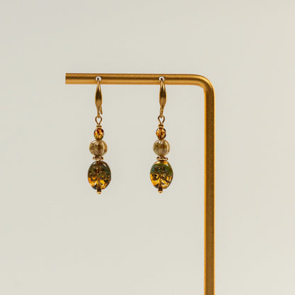 Kraaltjes oorbellen met klavervormige kraal