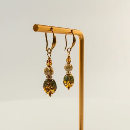 Kraaltjes oorbellen met klavervormige kraal