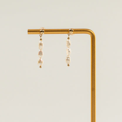 Oorbellen van barokparels in drieën