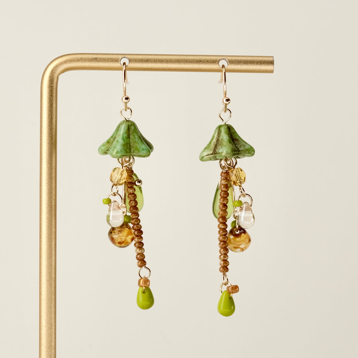 Green Czech glass mushroom earrings