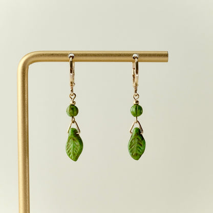 Mini green leaf Czech glass earrings