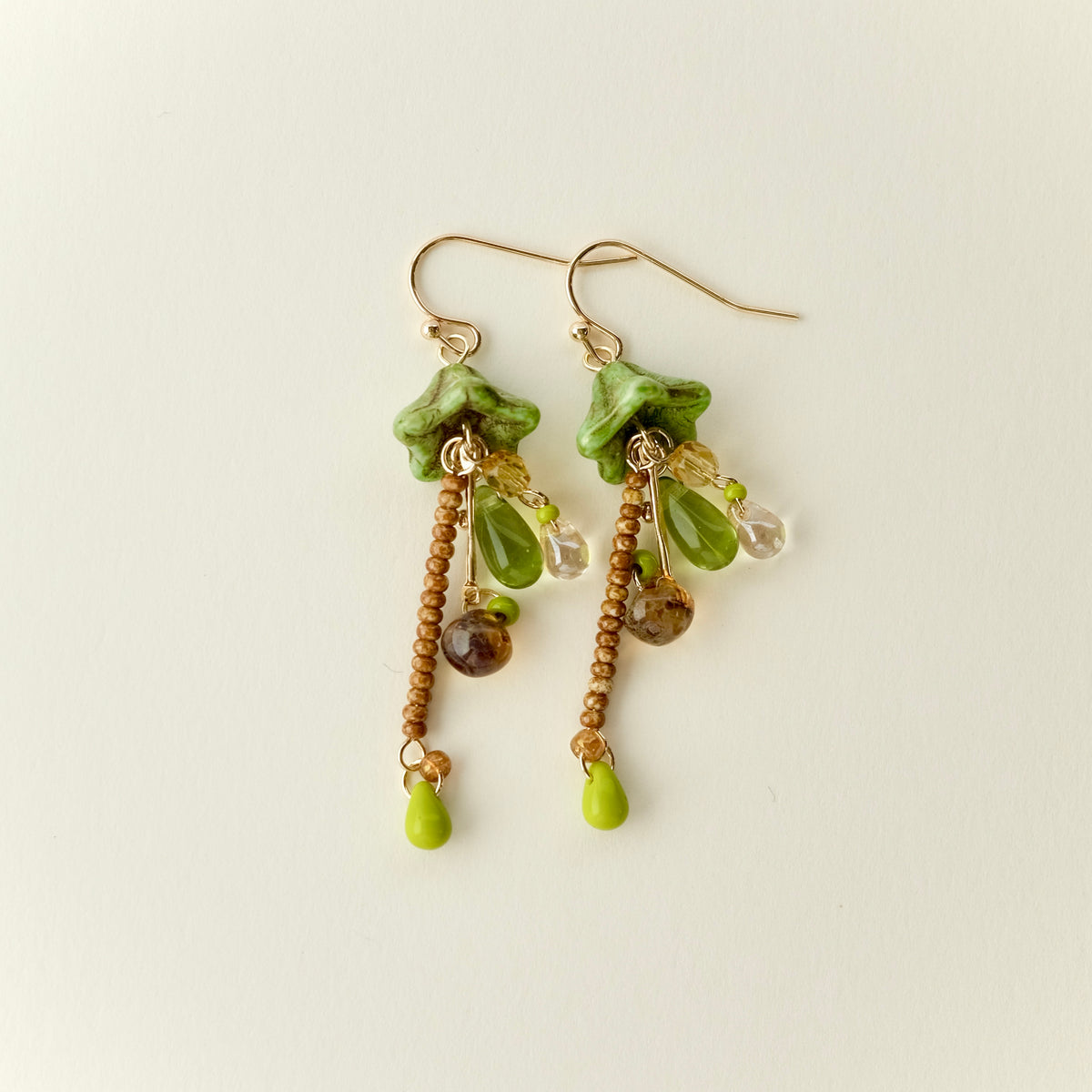 Green Czech glass mushroom earrings
