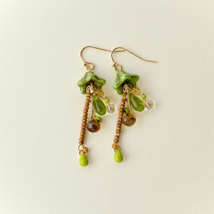 Green Czech glass mushroom earrings