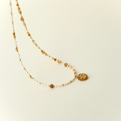 Half pearl amber necklace