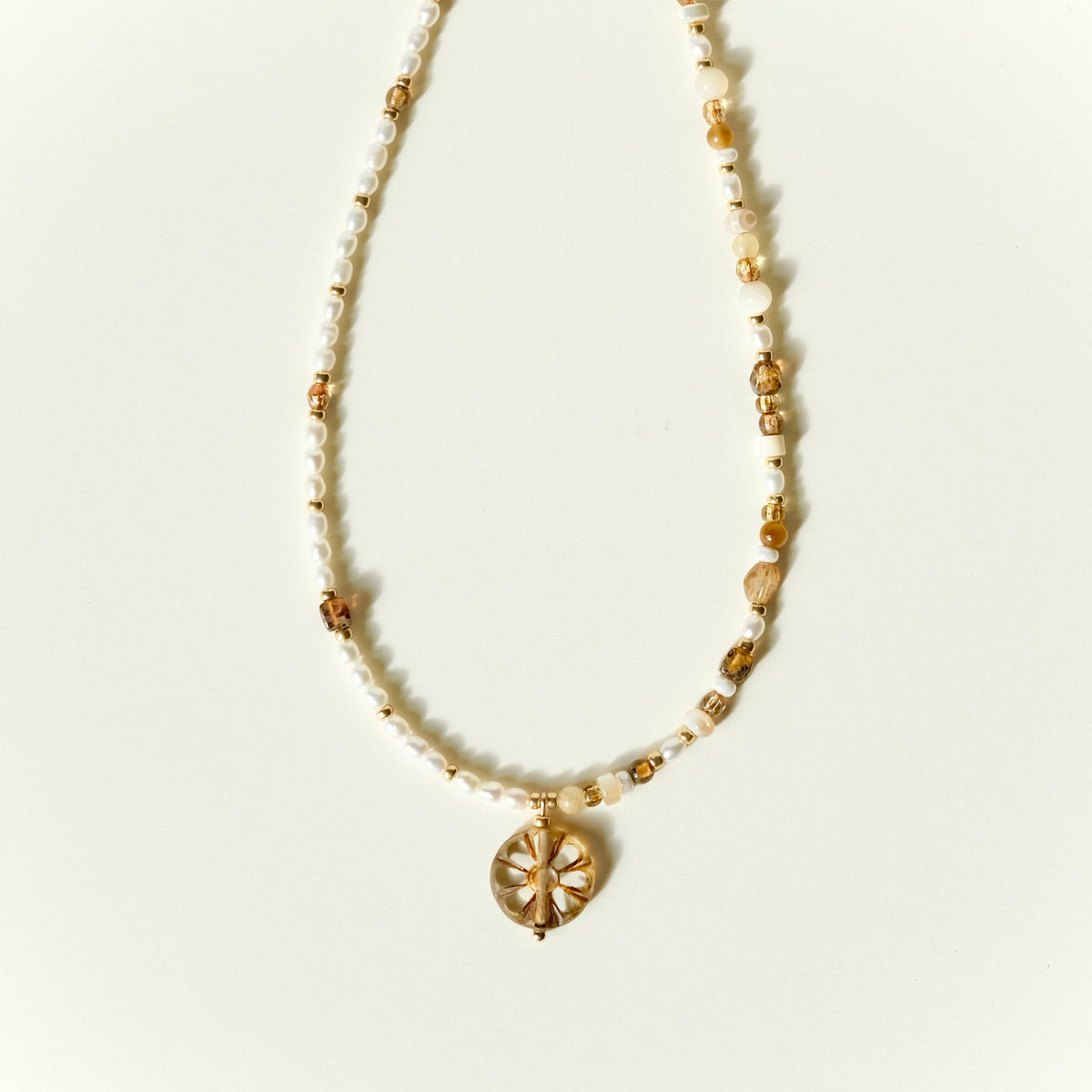Half pearl amber necklace