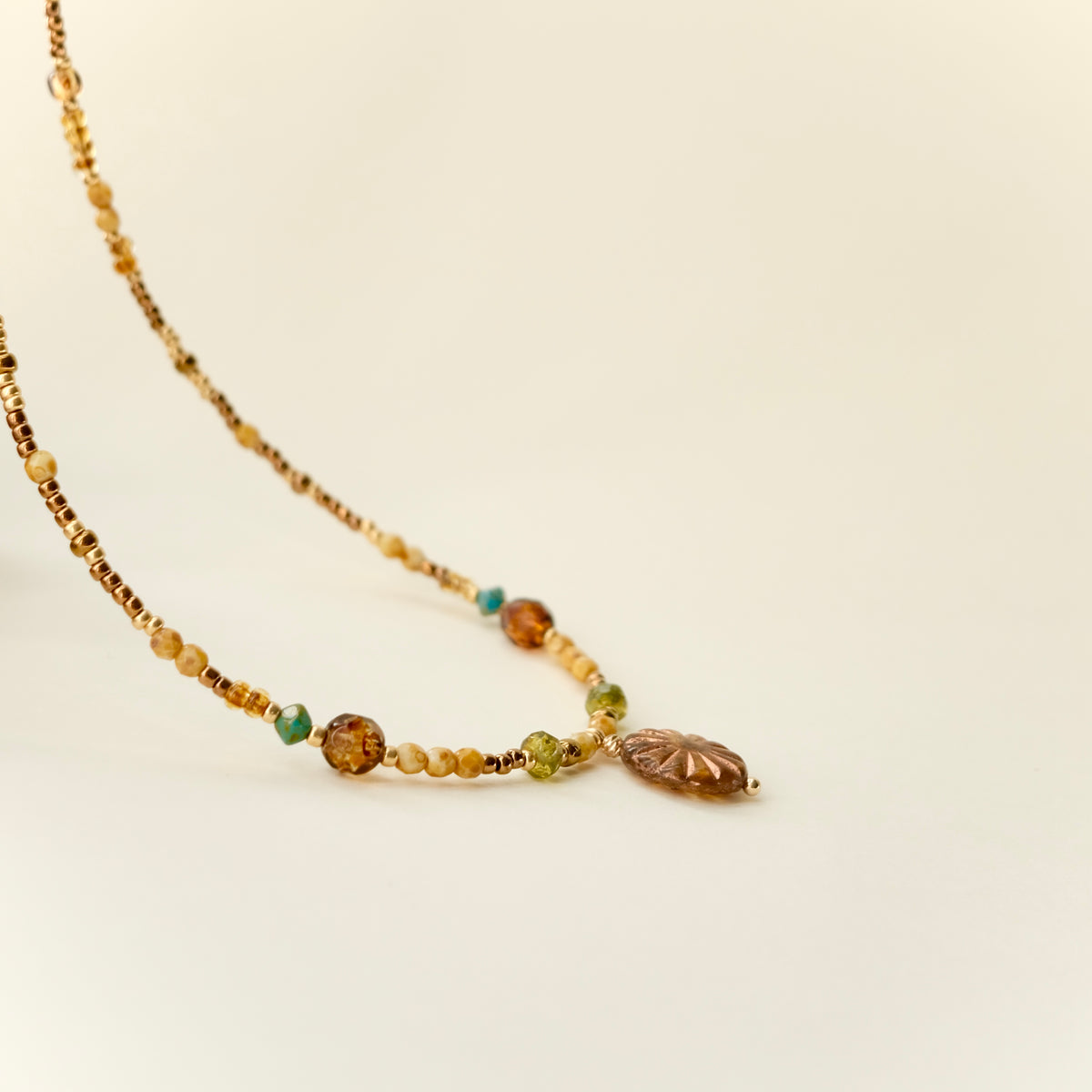 Antique bronze Czech glass sun necklace