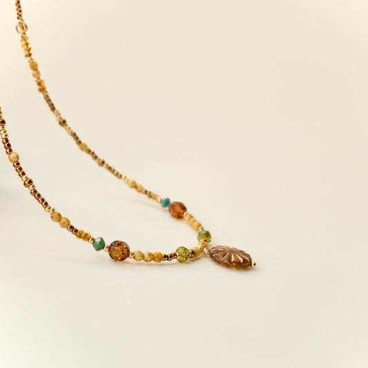 Antique bronze Czech glass sun necklace