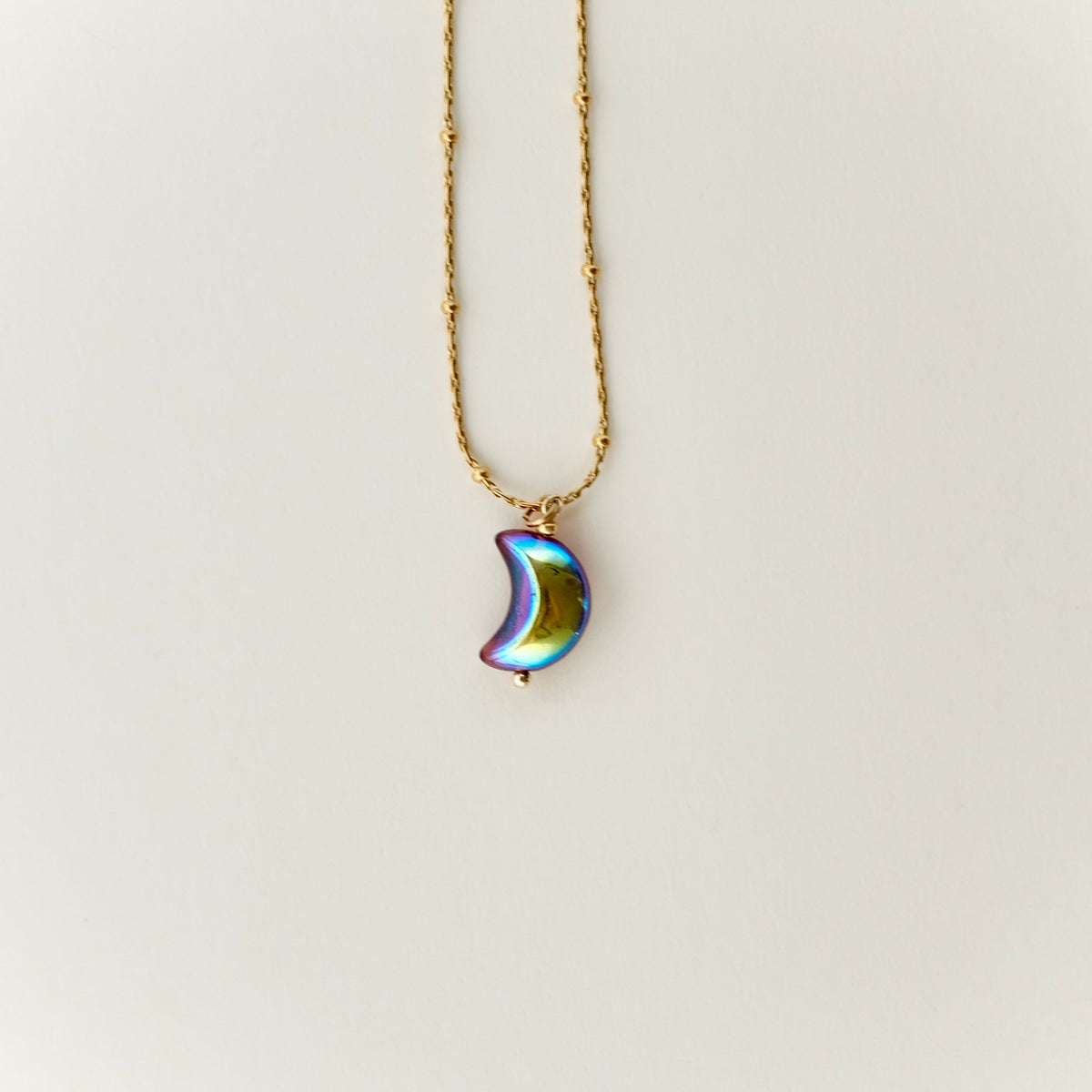 Double-sided fuchsia moon pendant