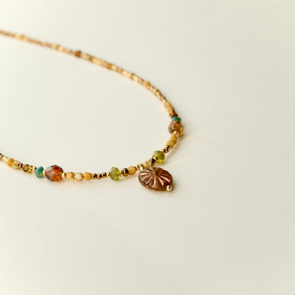 Antique bronze Czech glass sun necklace