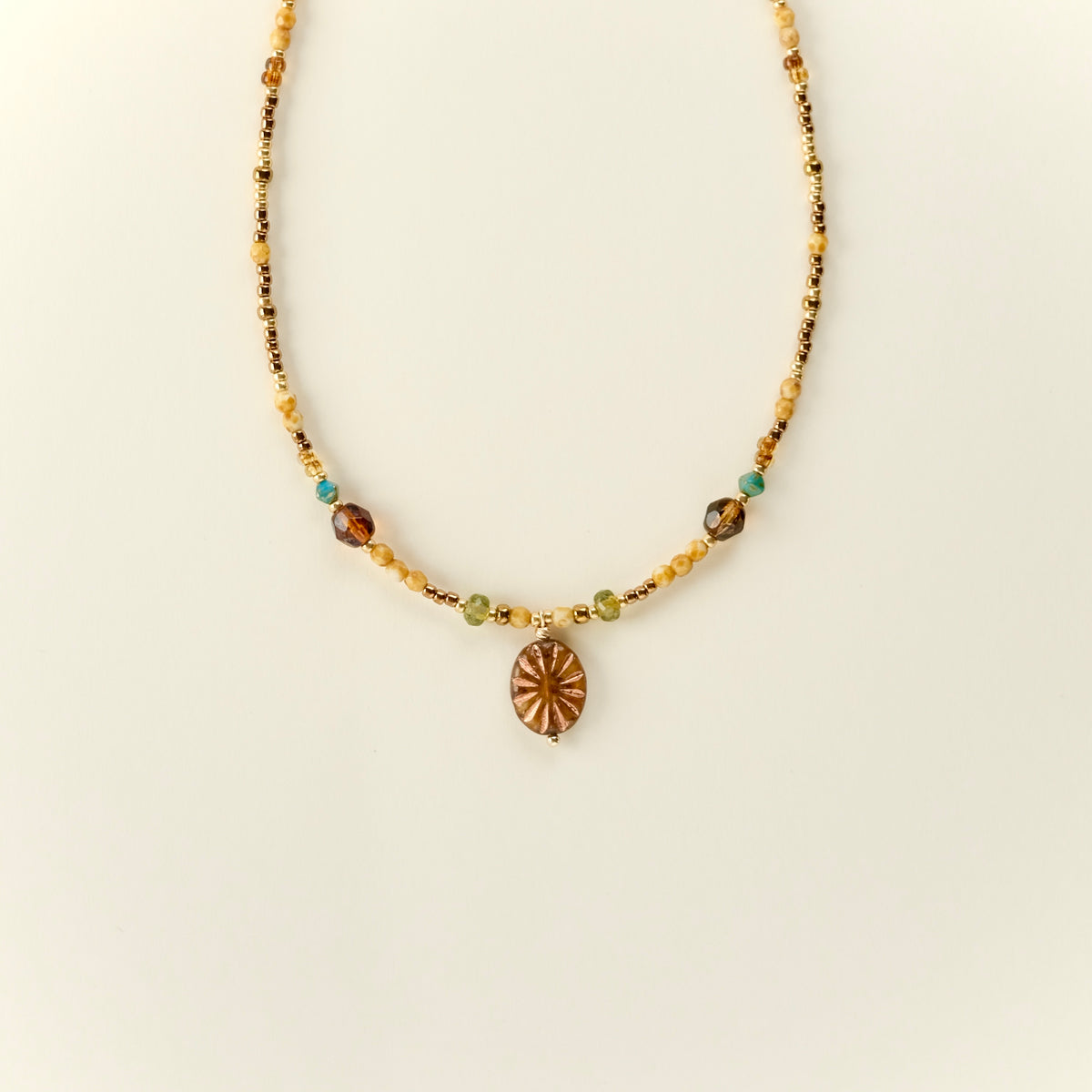 Antique bronze Czech glass sun necklace