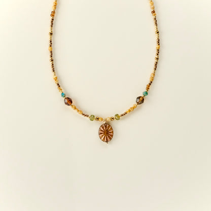 Antique bronze Czech glass sun necklace